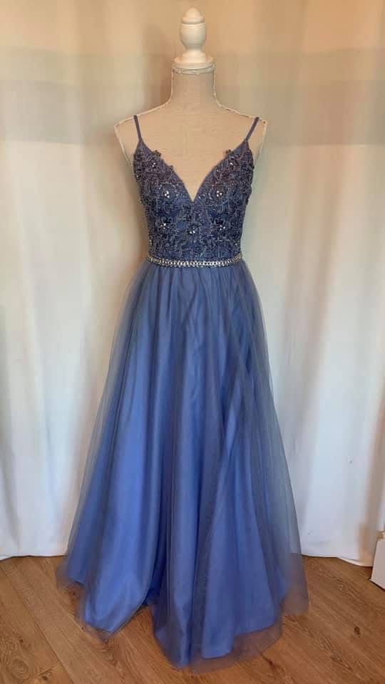 Blue embellished dress professionally resized by four dress sizes