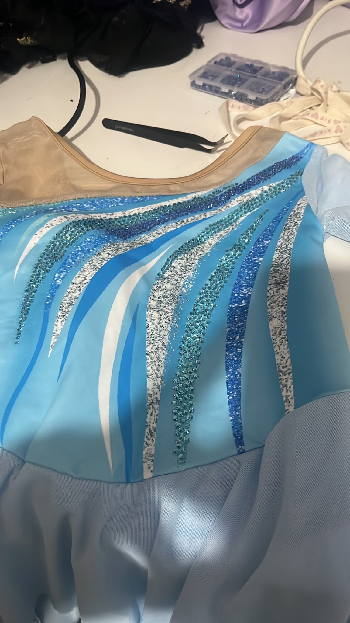 Child's figure skating dress altered and embellished with diamantes
